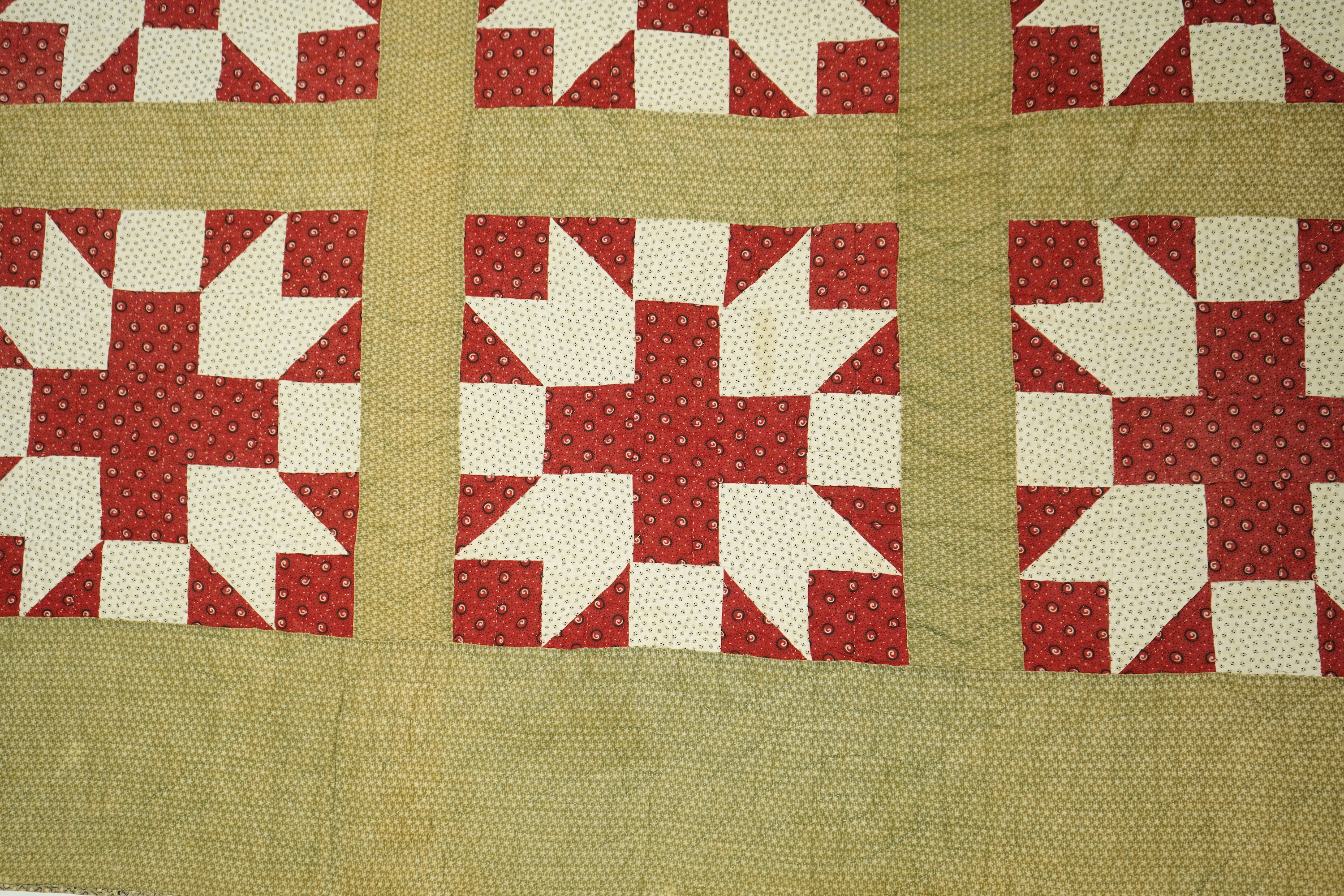 A late 19th century American, York County patchwork quilt, a similar pattern to Wild Goose Chase. Hand pieced and hand quilted, with label on reverse: York County Quilt documentation Project. G 53-2. The front worked in